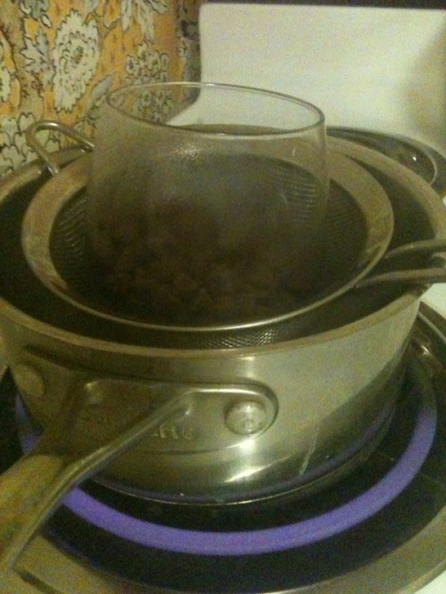 Oops, I don't own a glass bowl to make a double boiler. So I used a wine glass. Typical...